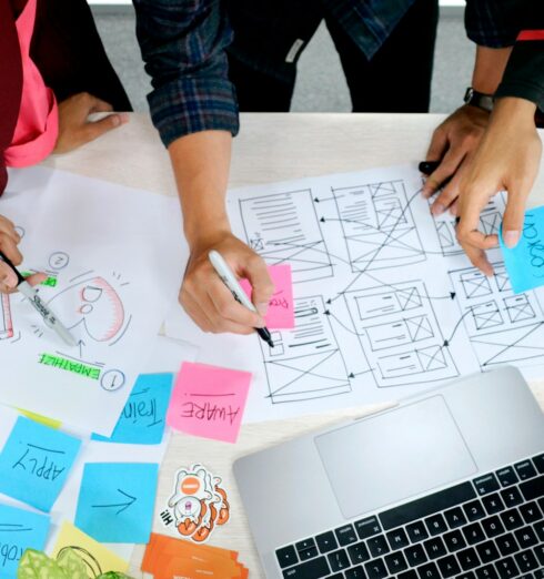 person writing on white paper